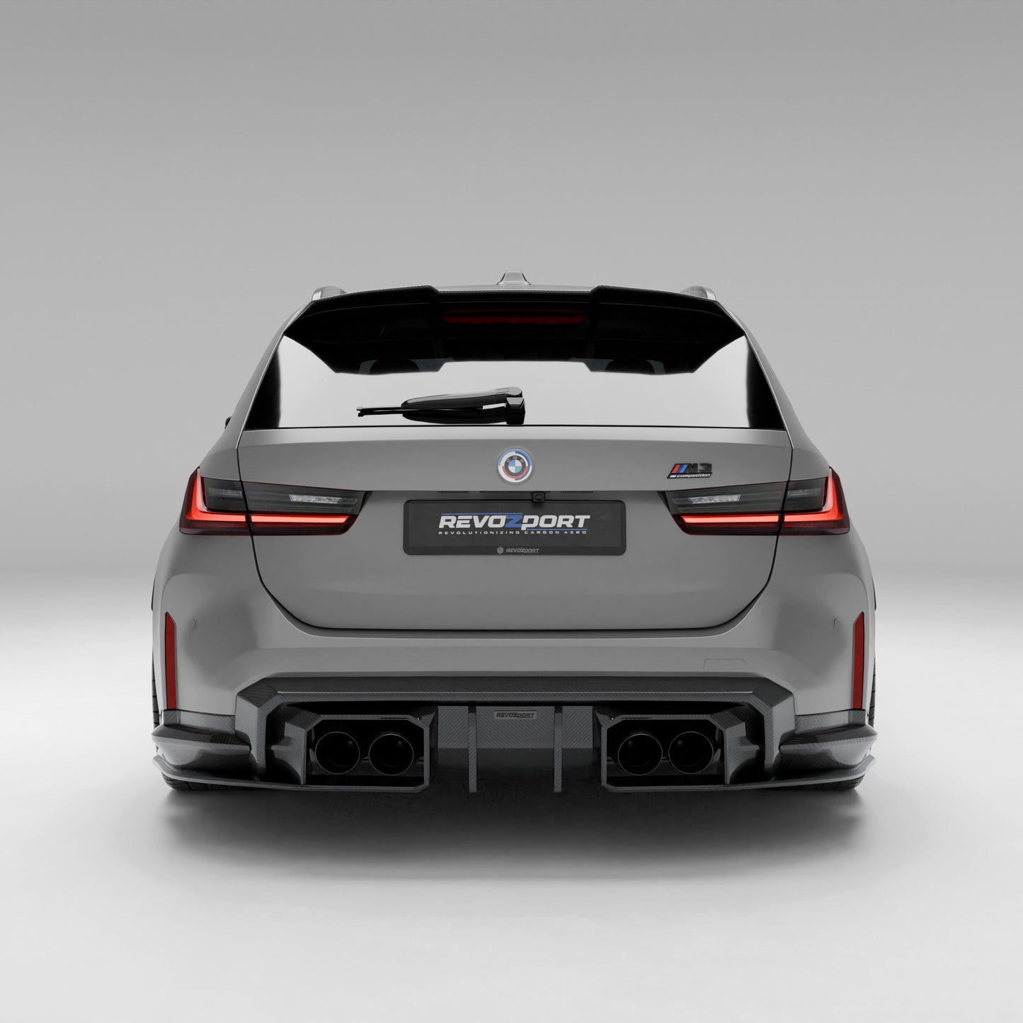 BMW M3 G81 carbon fiber rear diffuser mounted on rear bumper