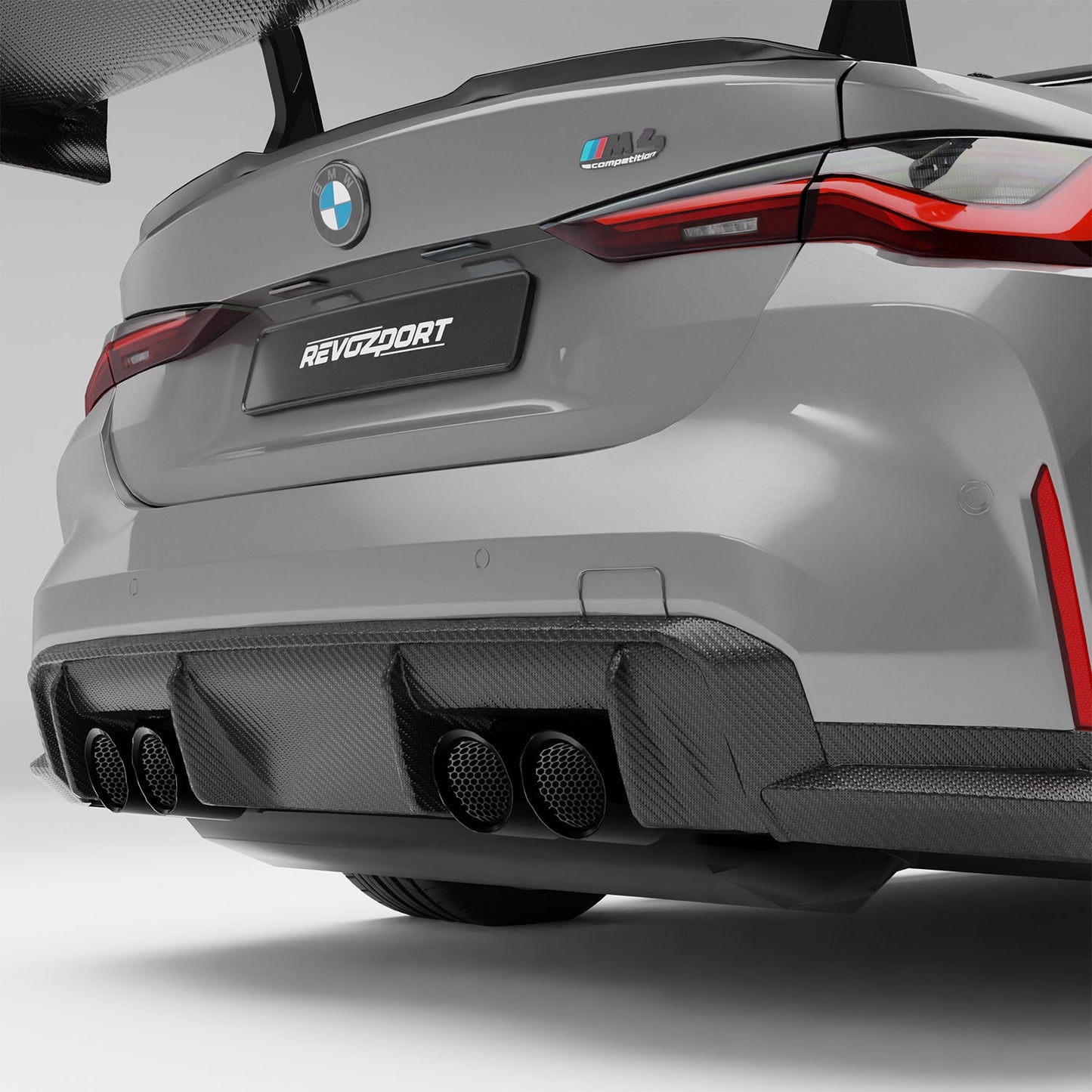 BMW M4 G82 carbon fiber rear diffuser, close-up of fin and weave detail