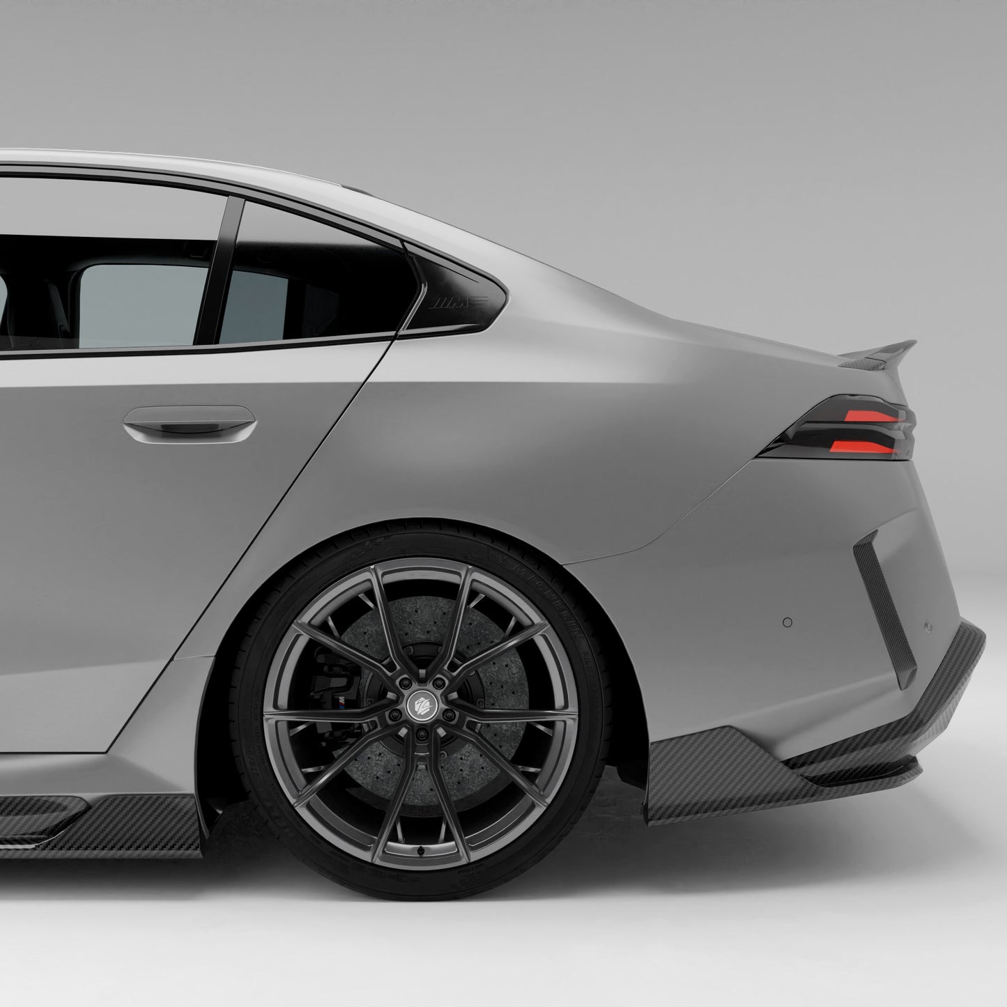 BMW M5 G90 carbon fiber rear diffuser full lower bumper view