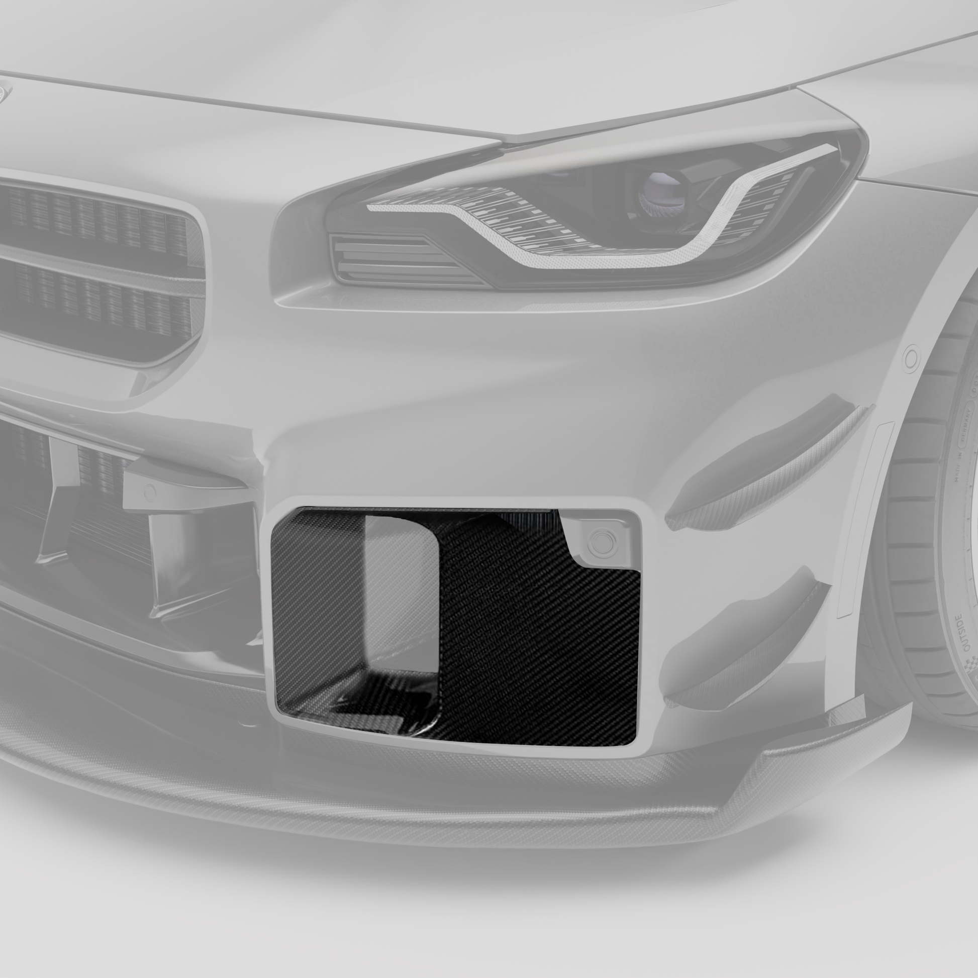 BMW M2 G87 carbon fiber block-off plates, angled detail of weave finish