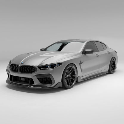 Carbon fiber front lip on BMW M8 against neutral backdrop