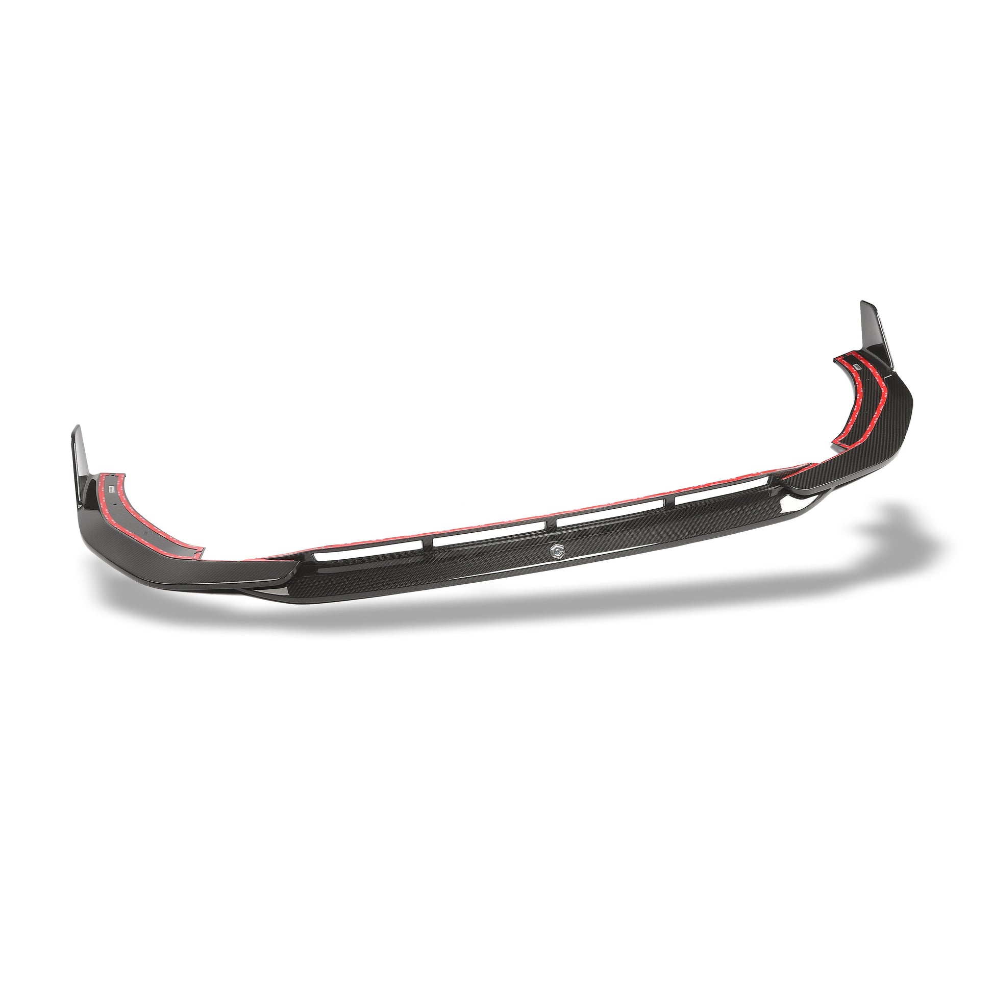 Audi RS5 carbon fiber front lip close-up showing the weave texture