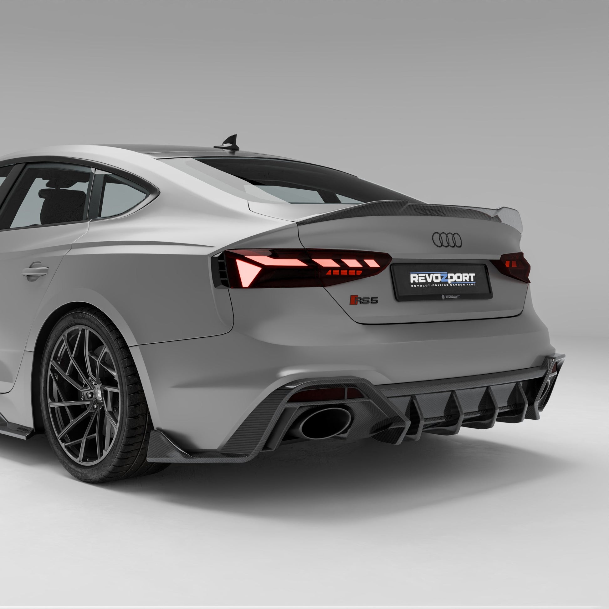 Audi RS5 B9.5 Sportback carbon fiber rear diffuser, rear three-quarter view