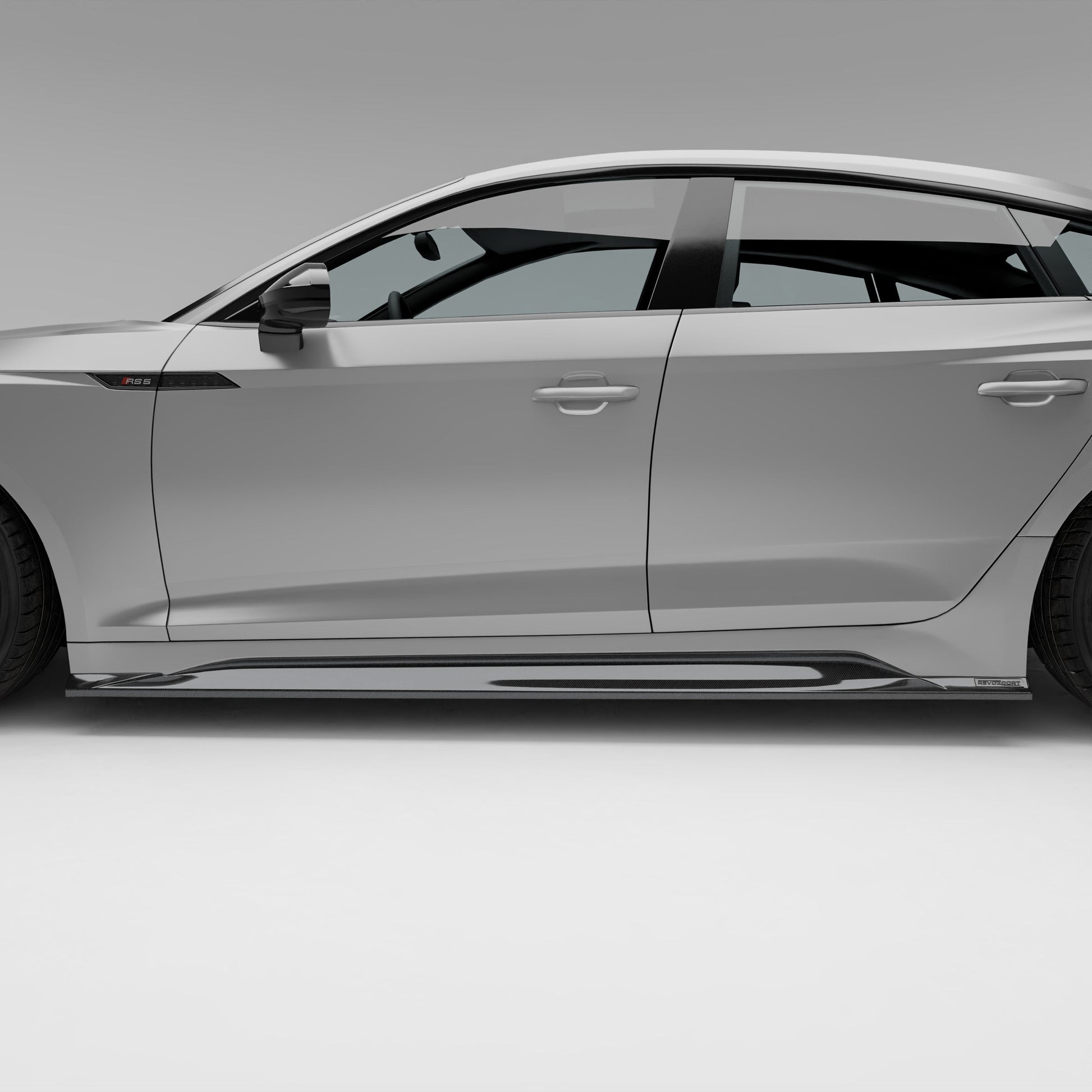 Audi RS5 Sportback carbon side skirt pair laid out detail shot