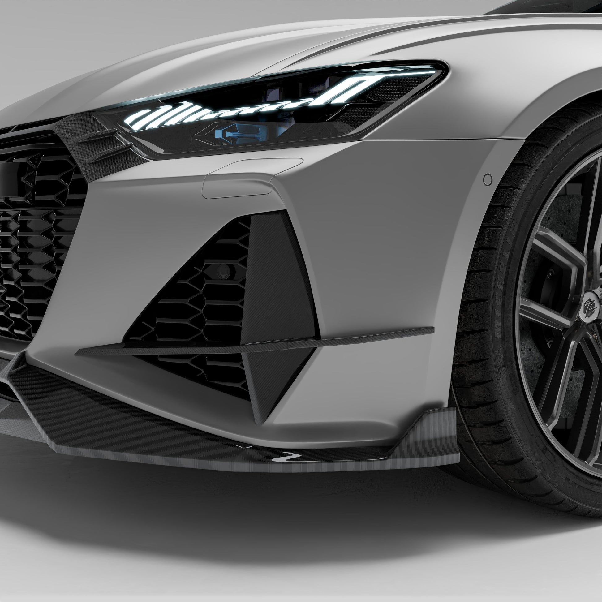 Audi RS6 C8 Avant carbon fiber canards on front bumper corner