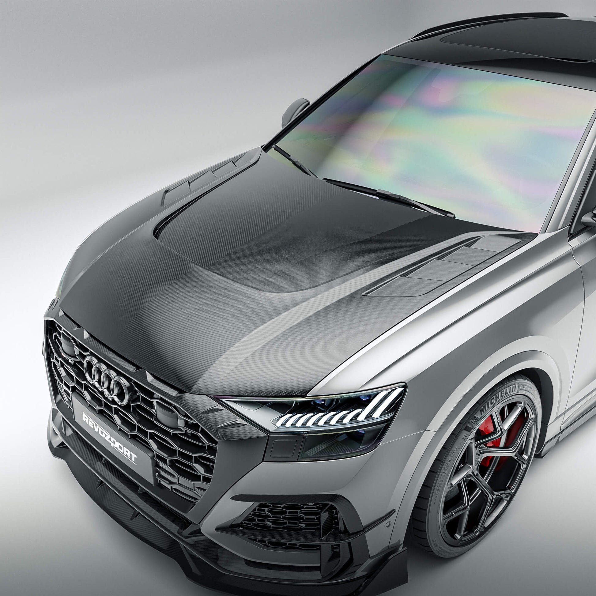 Audi RSQ8 4M Pre-LCI carbon fiber hood front view showing the exposed weave