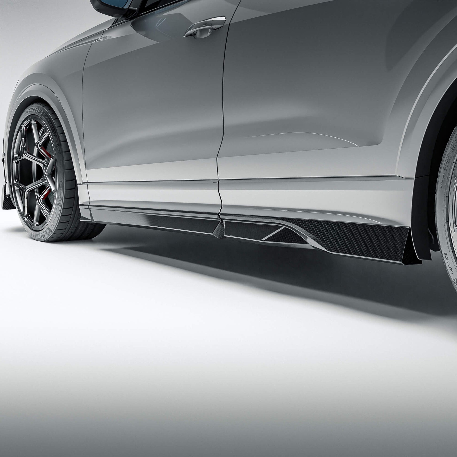 Audi RSQ8 4M Pre-LCI carbon fiber side skirts shown along the lower body, side profile view