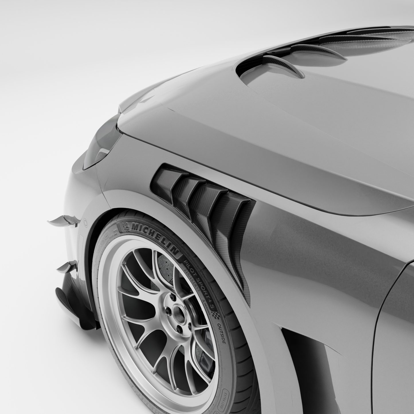 BMW M2 G87 carbon fiber hybrid front fender angled studio view