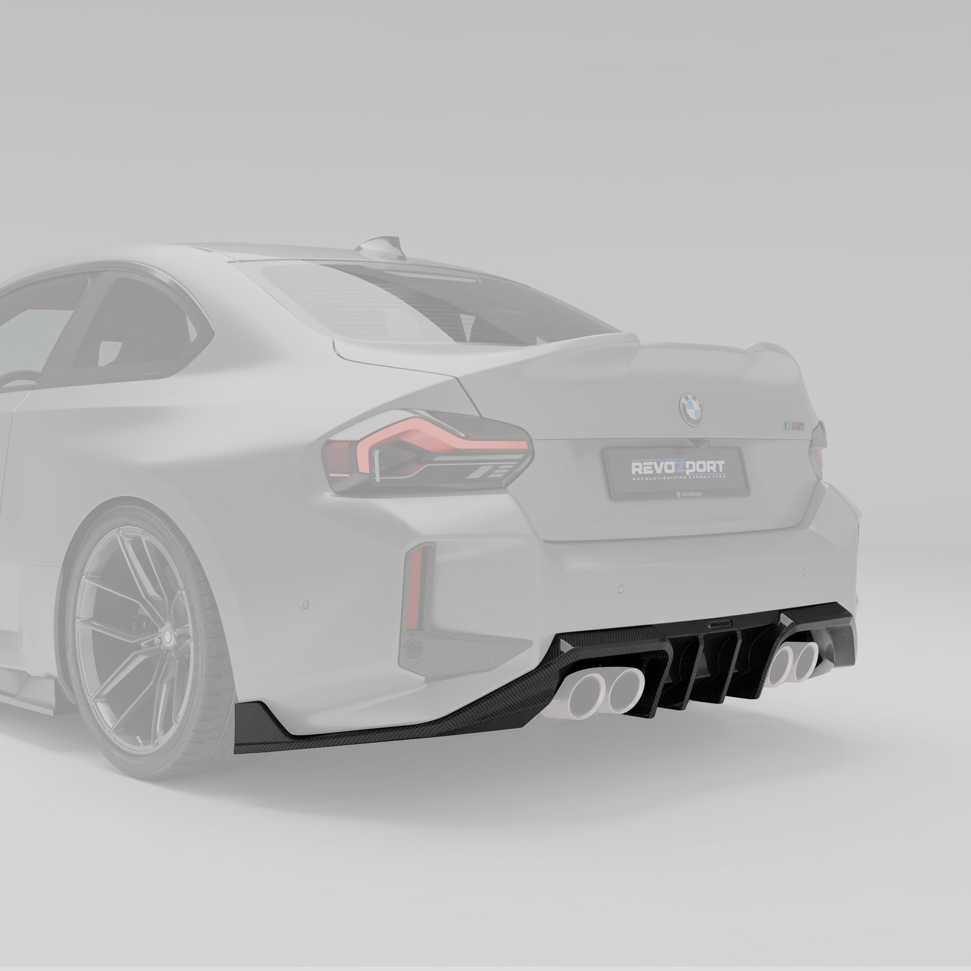 BMW M2 G87 carbon rear diffuser angled rear three-quarter view