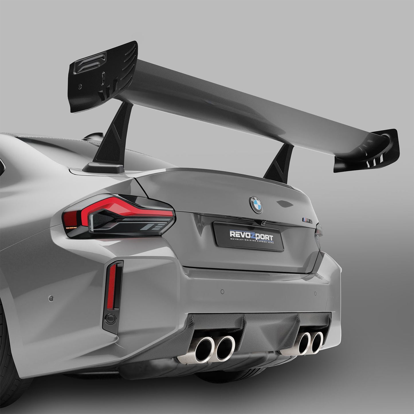 BMW M2 G87 carbon fiber rear wing rear view on track-ready coupe