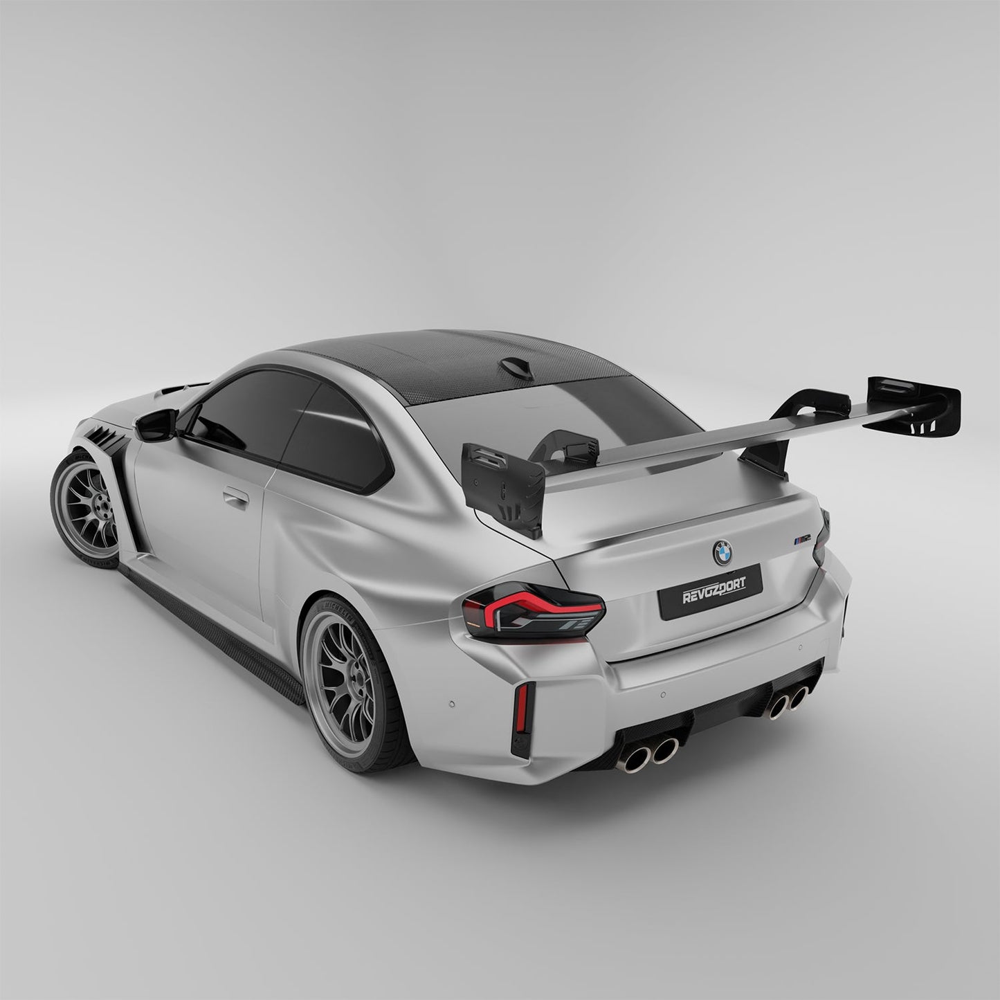 BMW M2 G87 carbon fiber race rear wing, rear three-quarter view on coupe