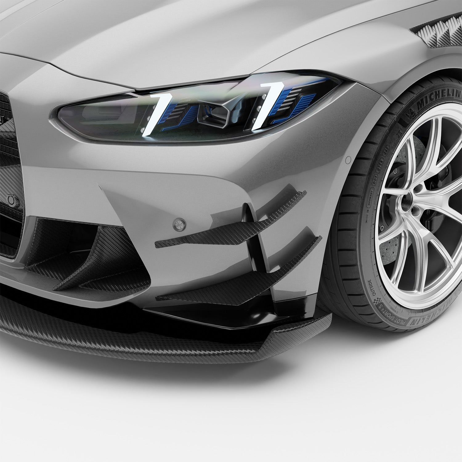 BMW M3 G80 carbon fiber canards, front bumper close-up