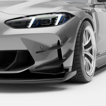 BMW M3 G80 carbon fiber front canards, close-up corner view