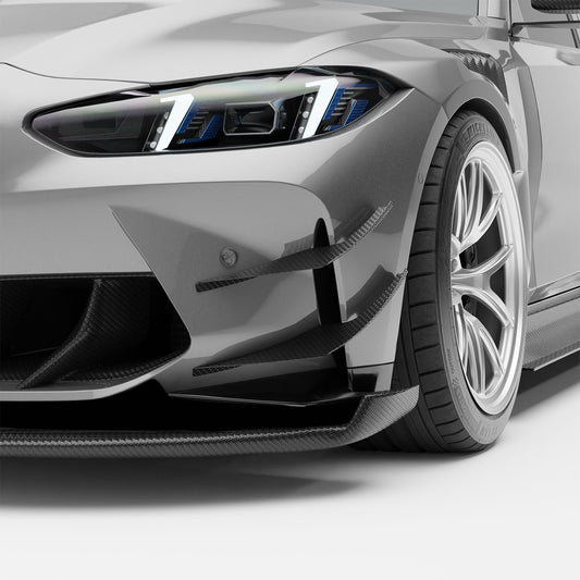 BMW M3 G80 carbon fiber front canards, close-up corner view