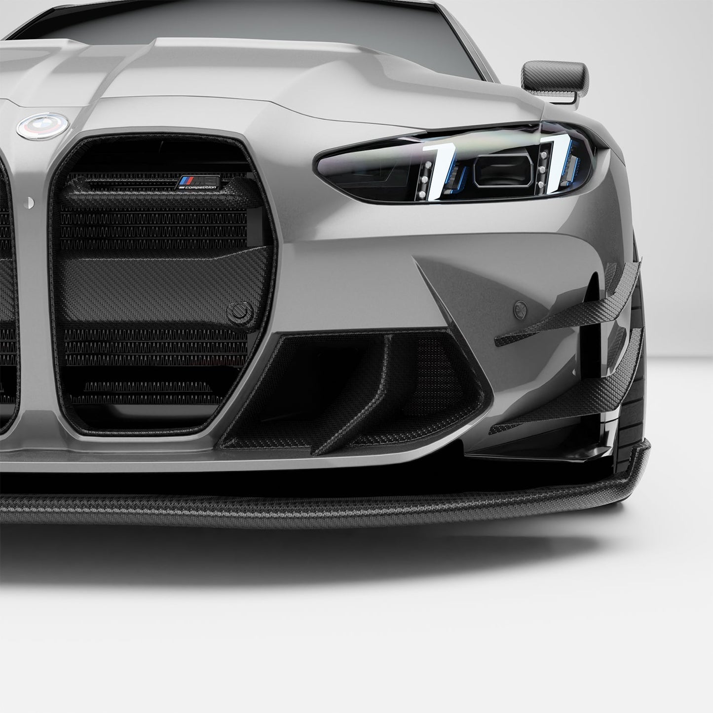 BMW M3 G80 carbon front inlets close-up on bumper corner