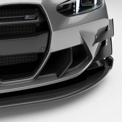 BMW M3 G80 carbon front bumper inlets installed, front quarter view