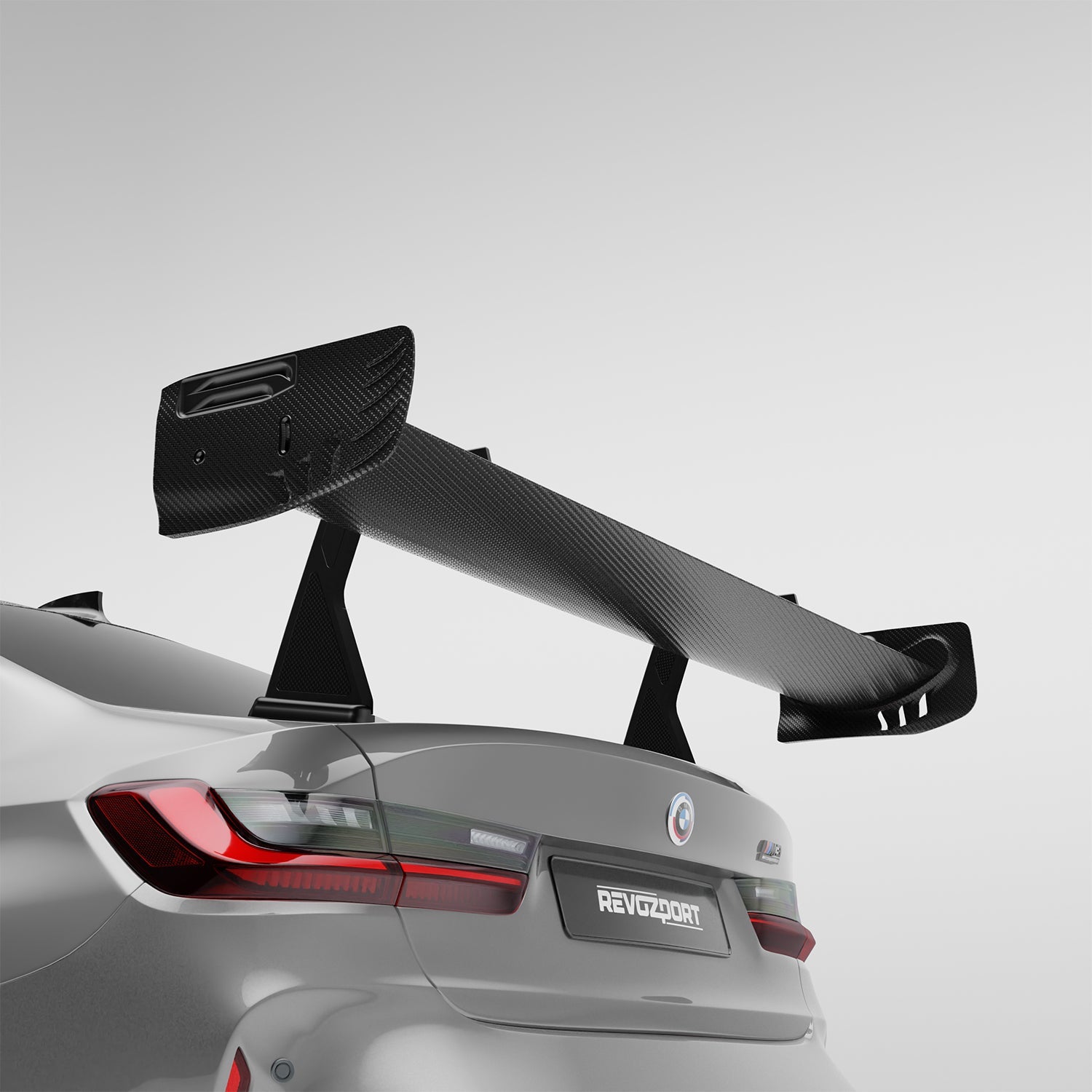 BMW M3 G80 carbon fiber rear wing mounted low angle view