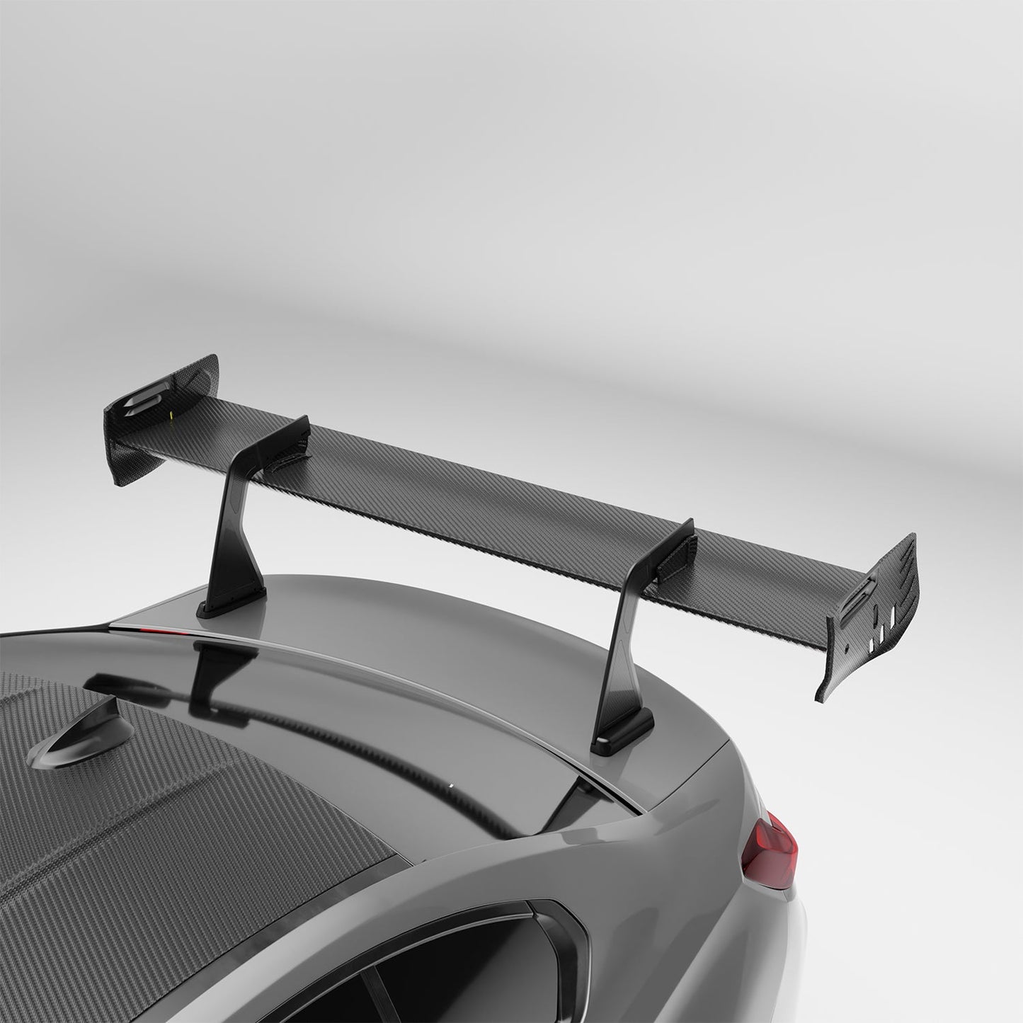 BMW M3 G80 carbon fiber rear wing trailing edge close-up