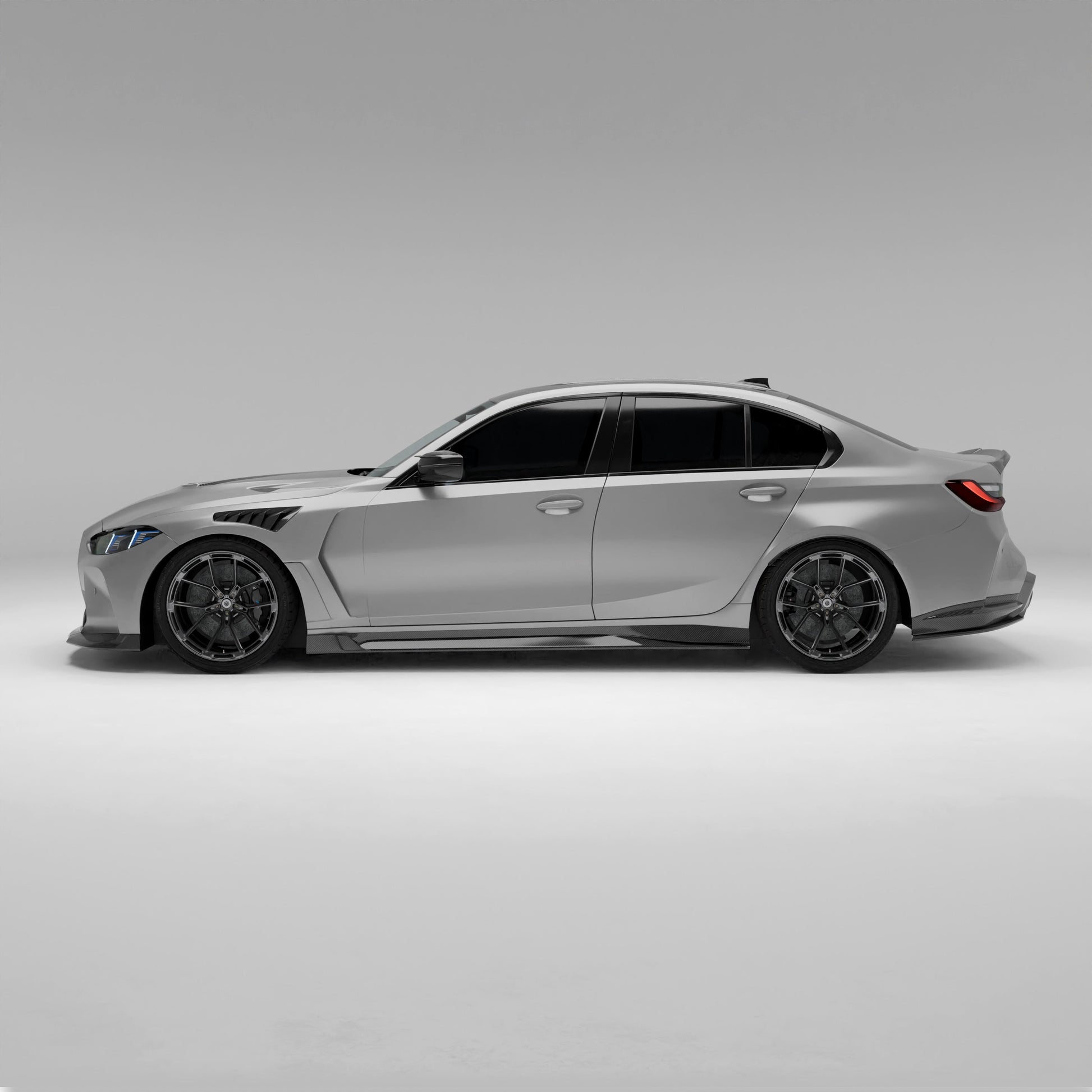 BMW M3 G80 side skirts paired with front lip, three-quarter view