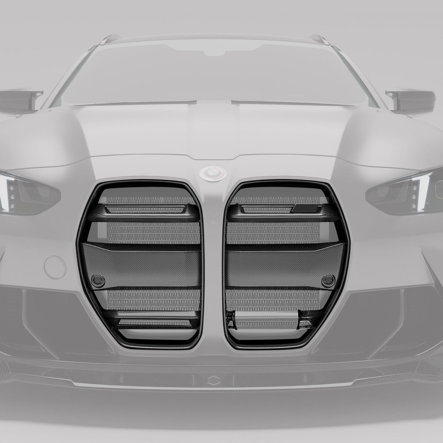BMW M3 G81 carbon front grille angled view showing carbon weave