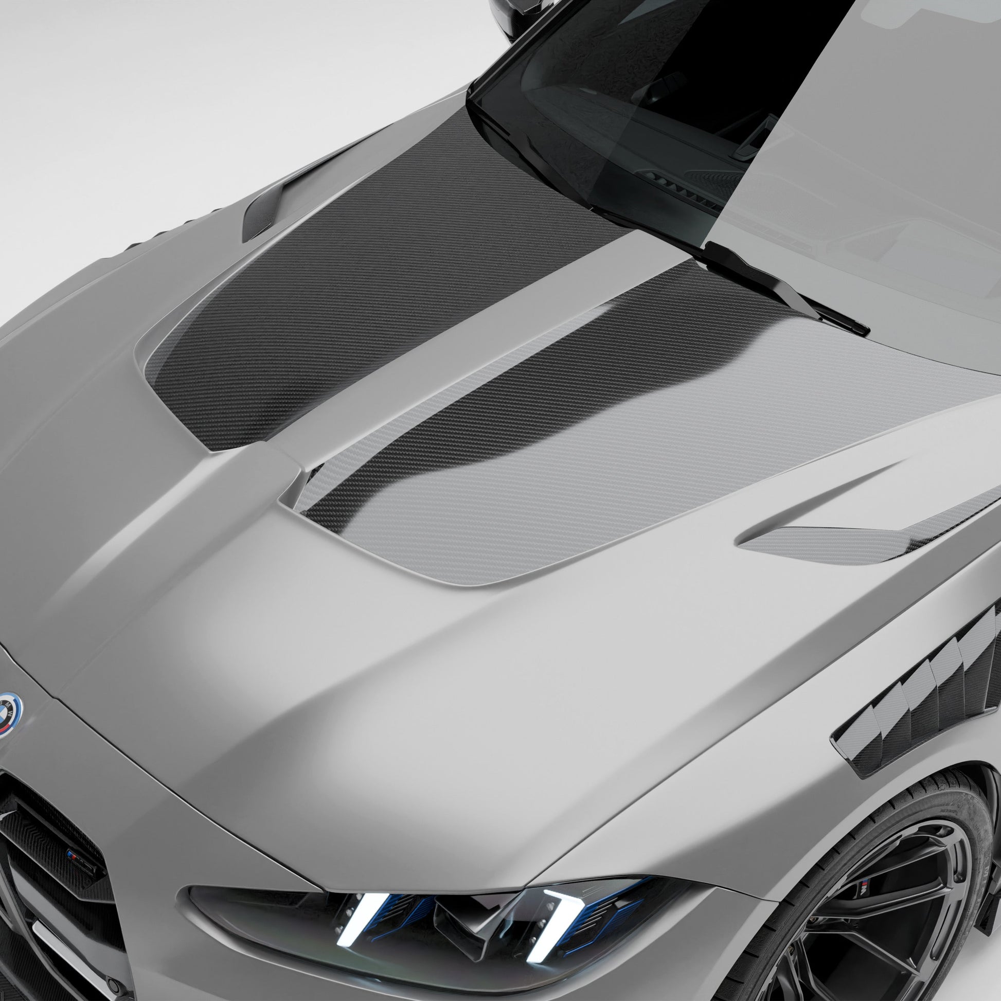BMW M3 G81 carbon fiber hood mounted front end angle view