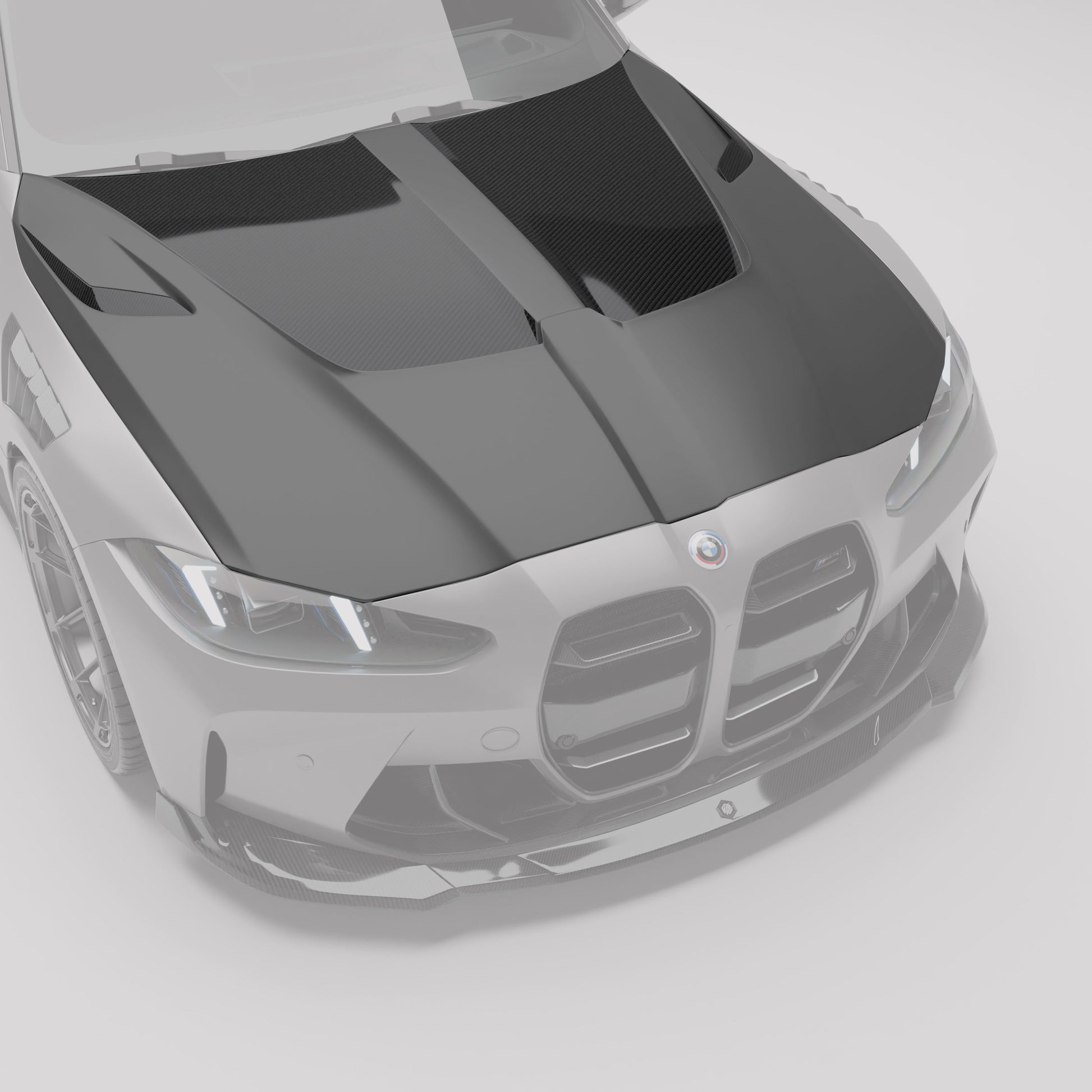 BMW M3 G81 carbon fiber hood top angle showing vent layout