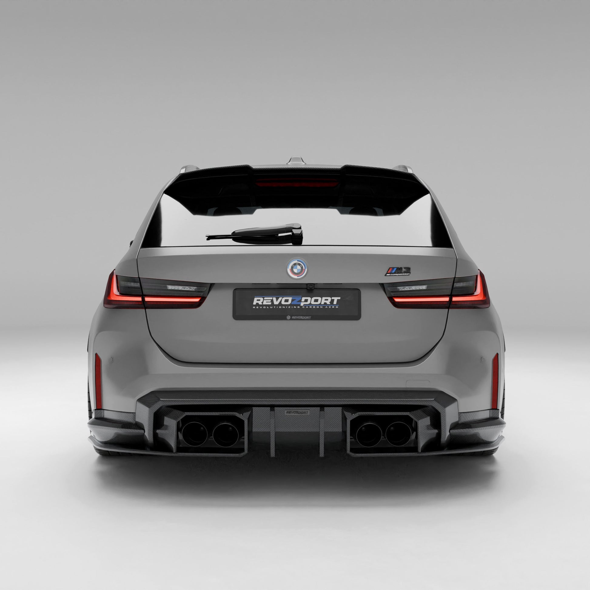 BMW M3 G81 carbon fiber rear diffuser mounted on rear bumper
