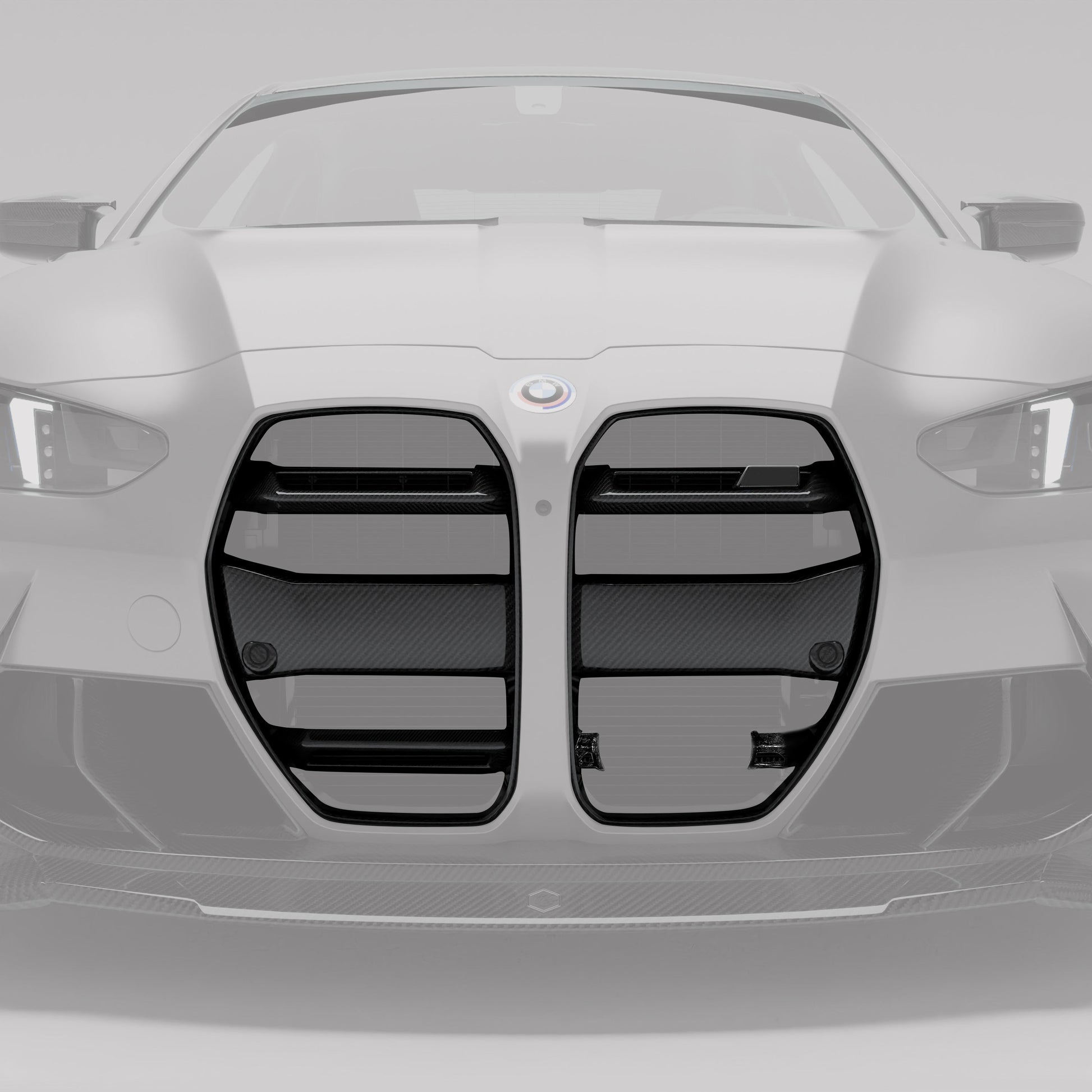BMW M4 G82 carbon front grille angled view showing carbon weave