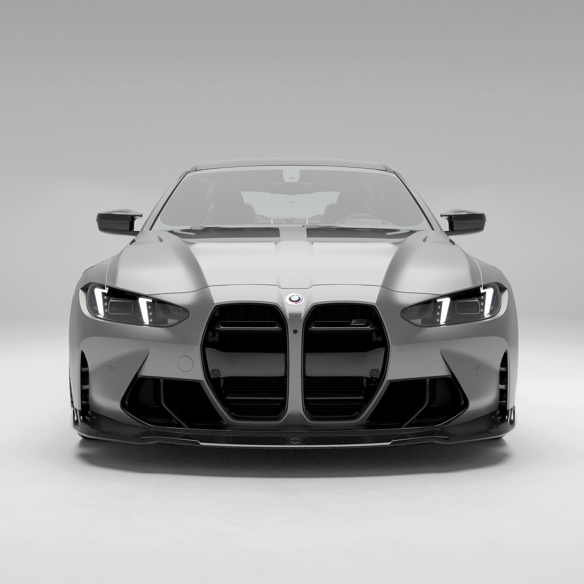 BMW M4 G82 carbon fiber front trim, front-facing studio view