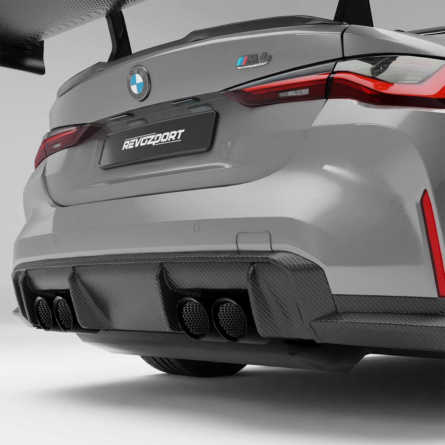 BMW M4 G82 carbon fiber rear diffuser, close-up of fin and weave detail