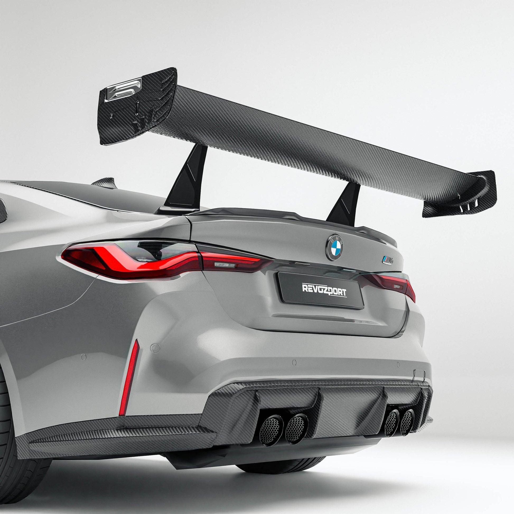 BMW M4 G82 carbon fiber rear wing trailing edge close-up