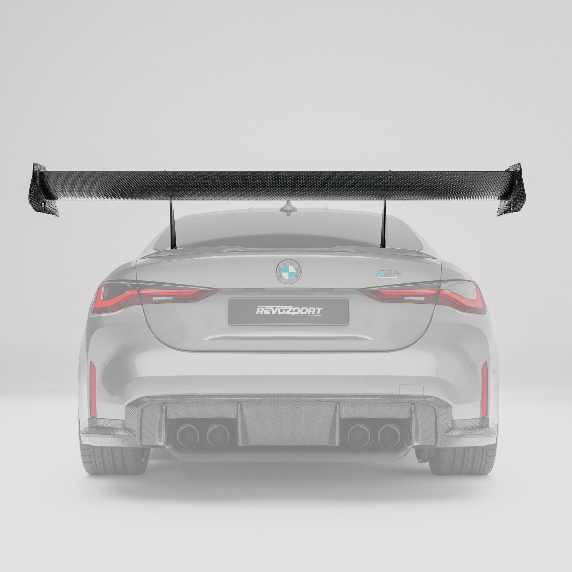BMW M4 G82 carbon fiber rear wing side profile showing airfoil shape