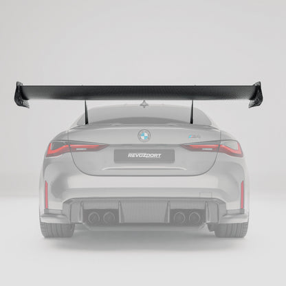 BMW M4 G82 carbon fiber rear wing side profile showing airfoil shape