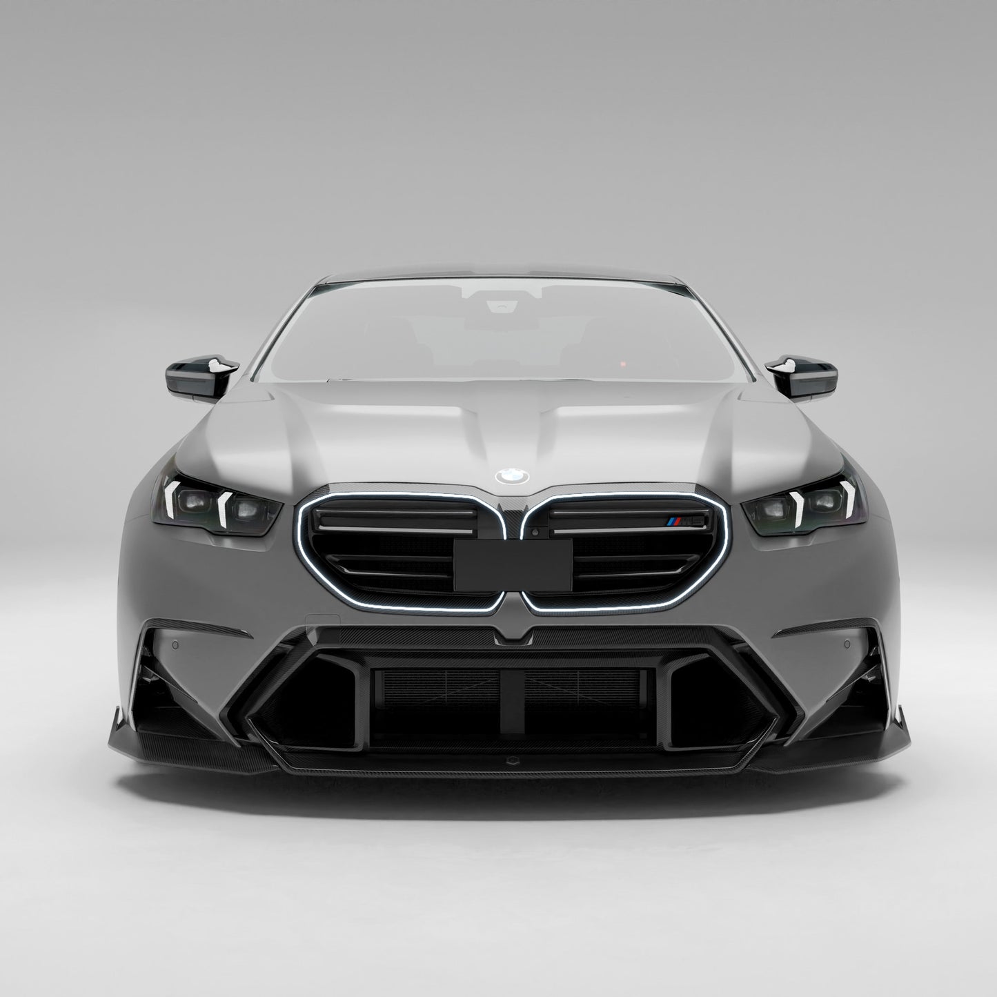 BMW M5 G90 carbon fiber front air vents installed bumper view