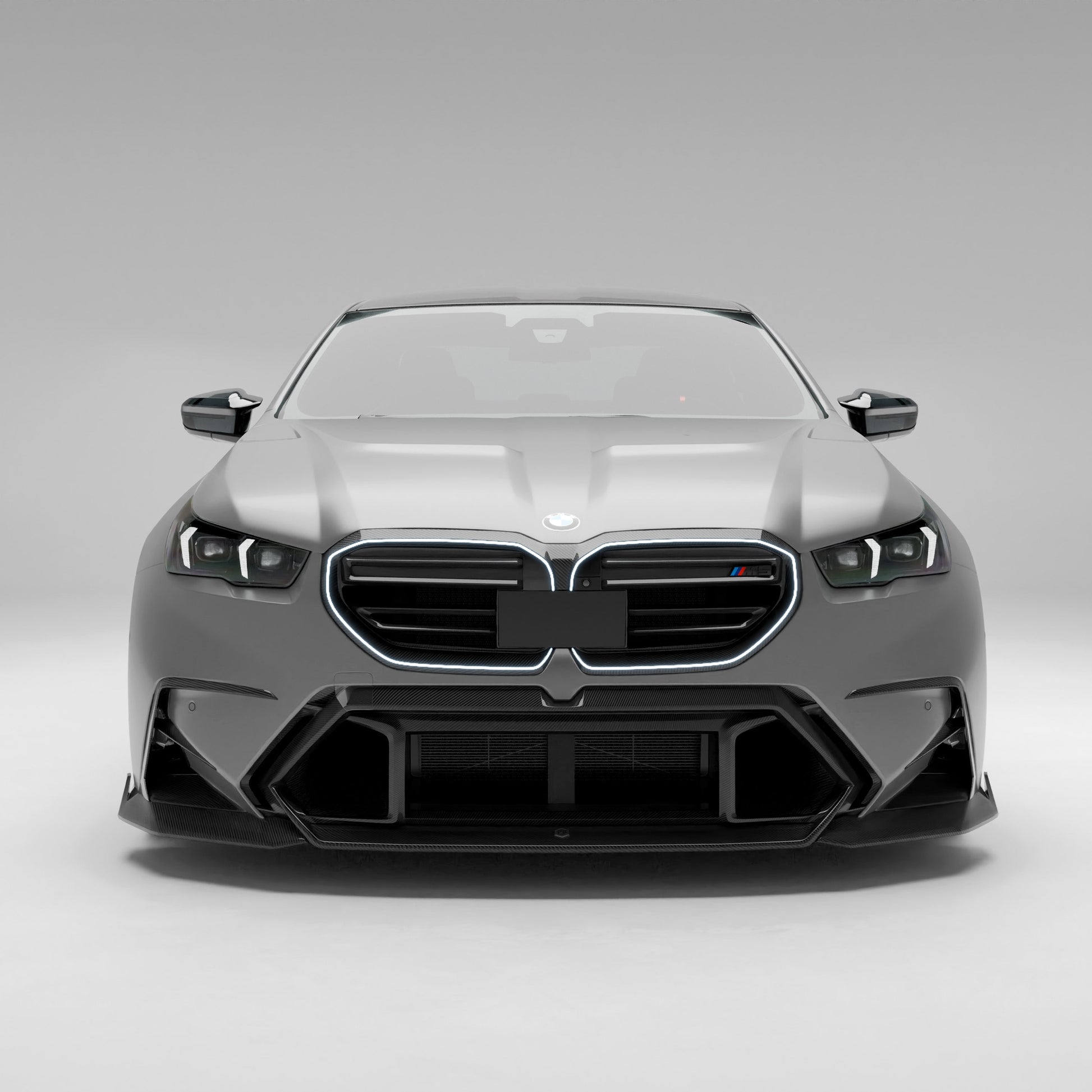 BMW M5 G90 carbon fiber front air vents installed bumper view