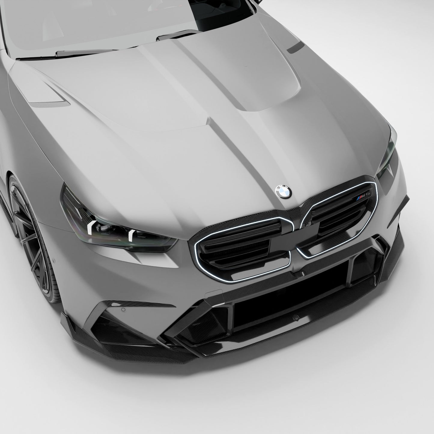 BMW M5 G90 carbon fiber vented hood front three-quarter view