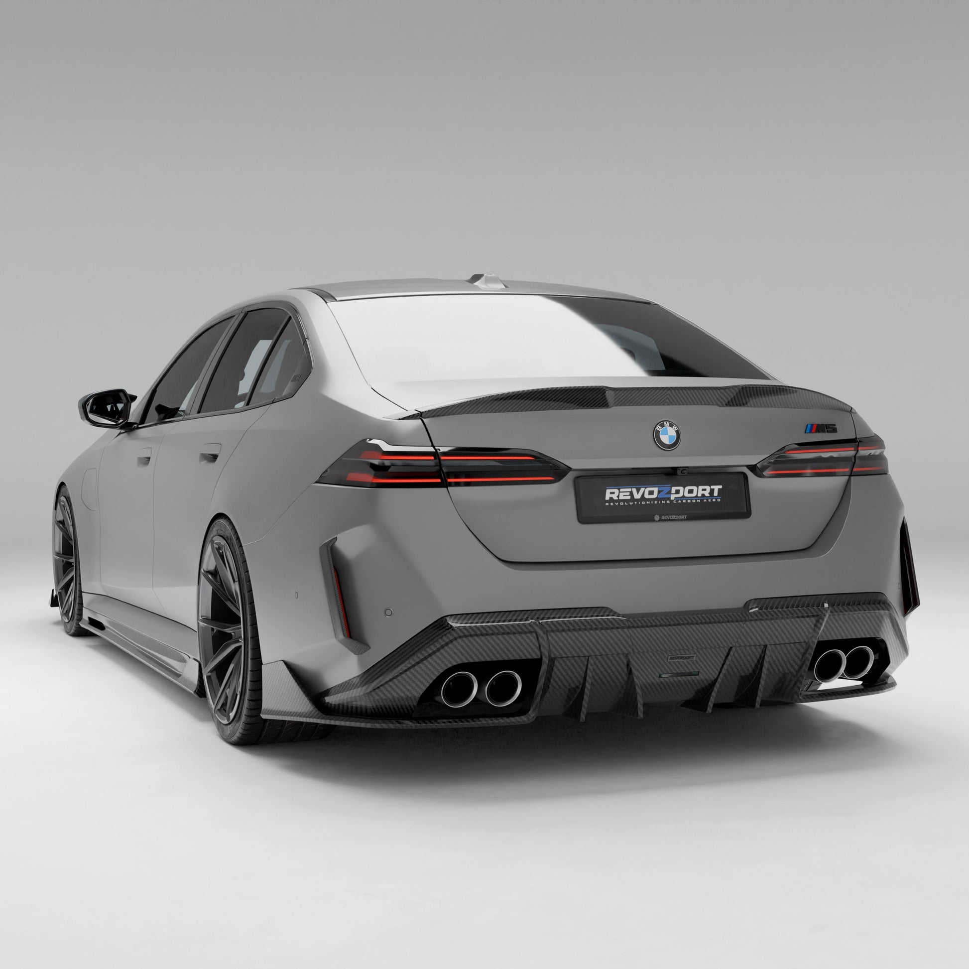 BMW M5 G90 carbon fiber rear diffuser straight rear stance view