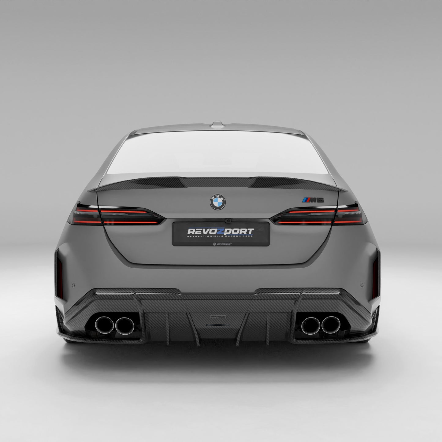 BMW M5 G90 carbon fiber spoiler installed straight rear view