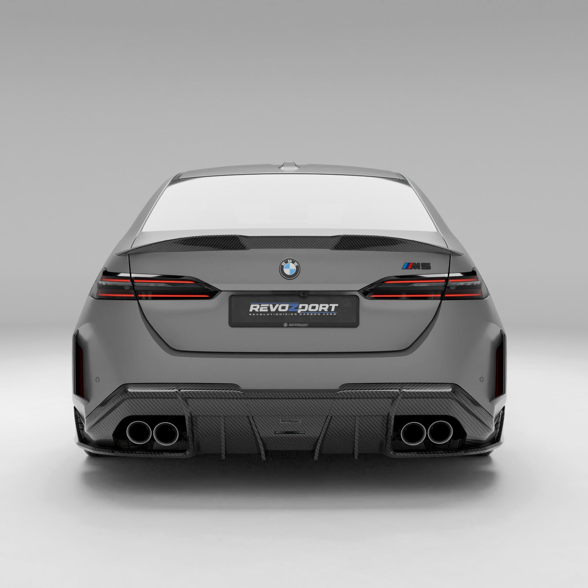 BMW M5 G90 carbon fiber spoiler installed straight rear view