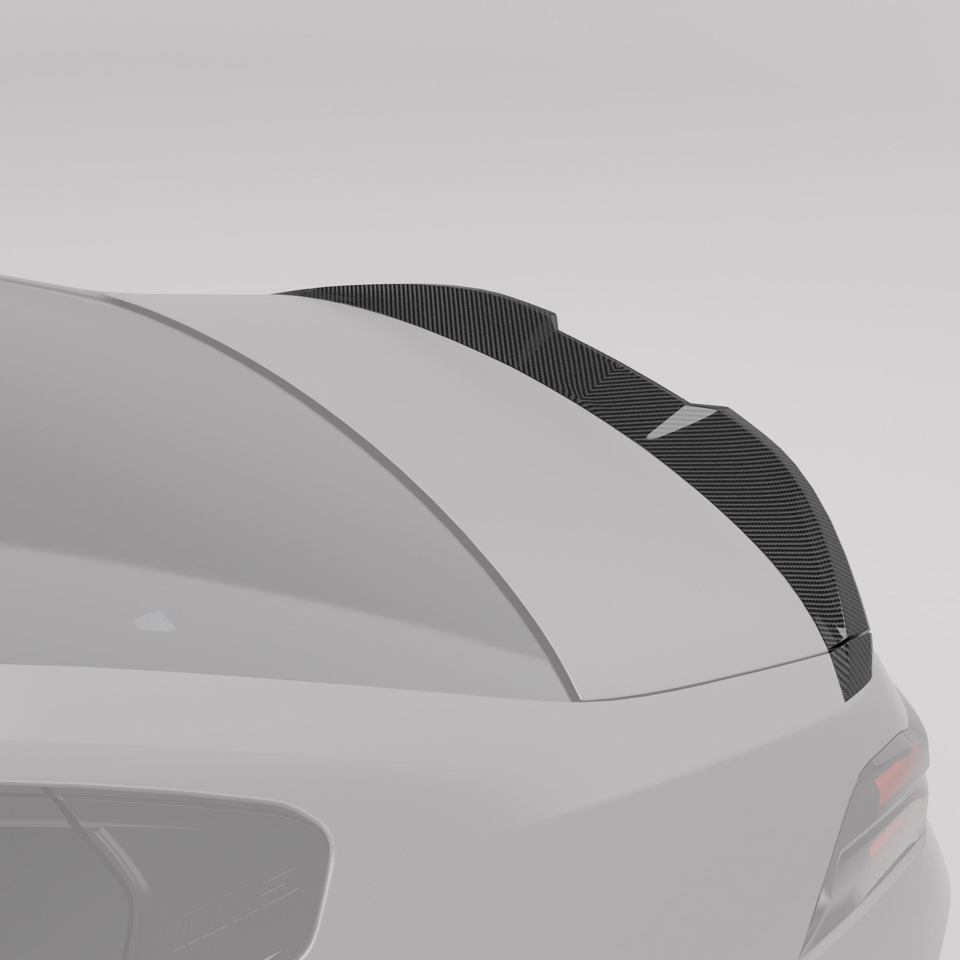 BMW M5 G90 carbon fiber spoiler mounted on trunk lid angle view