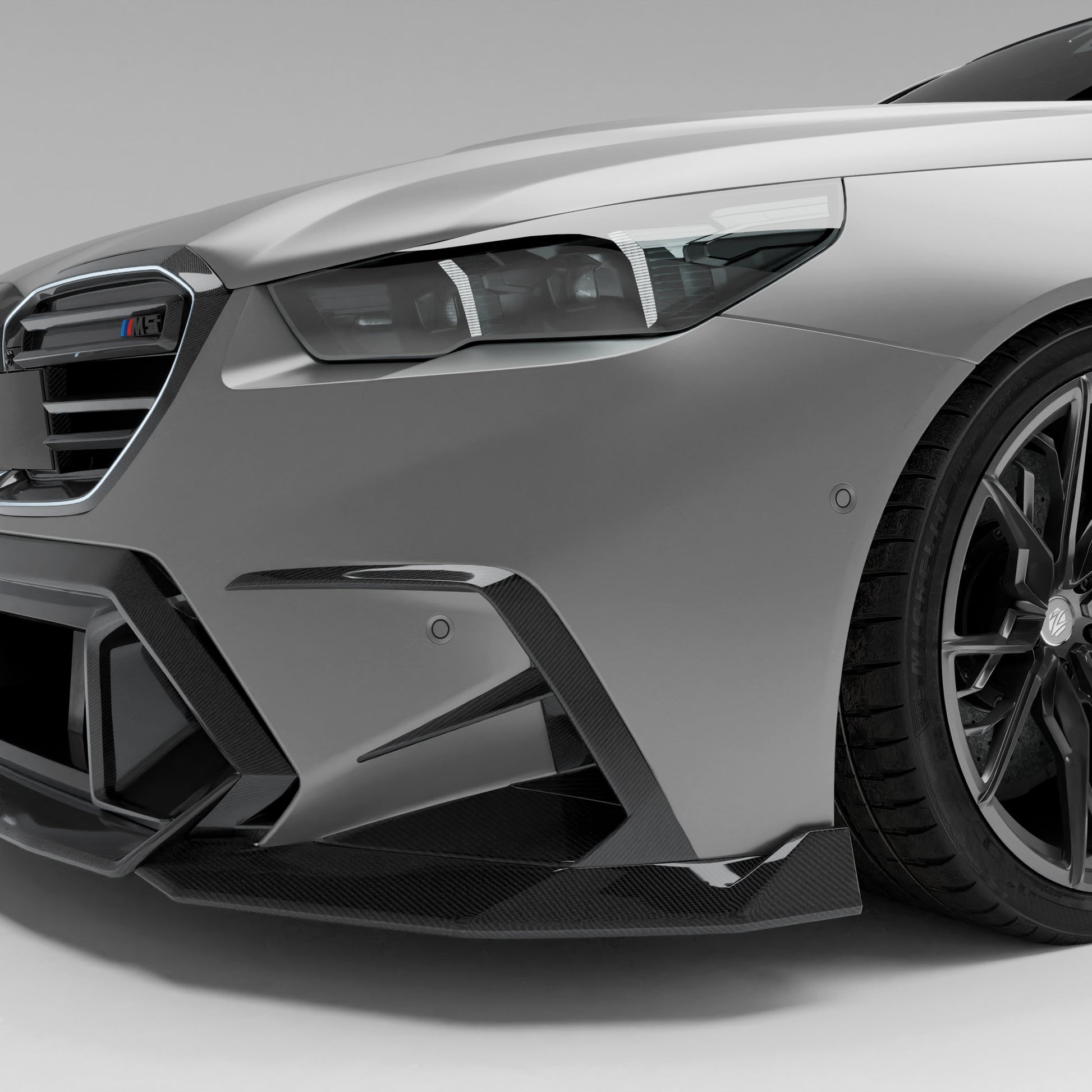 BMW M5 G99 Touring carbon fiber front canards front corner view
