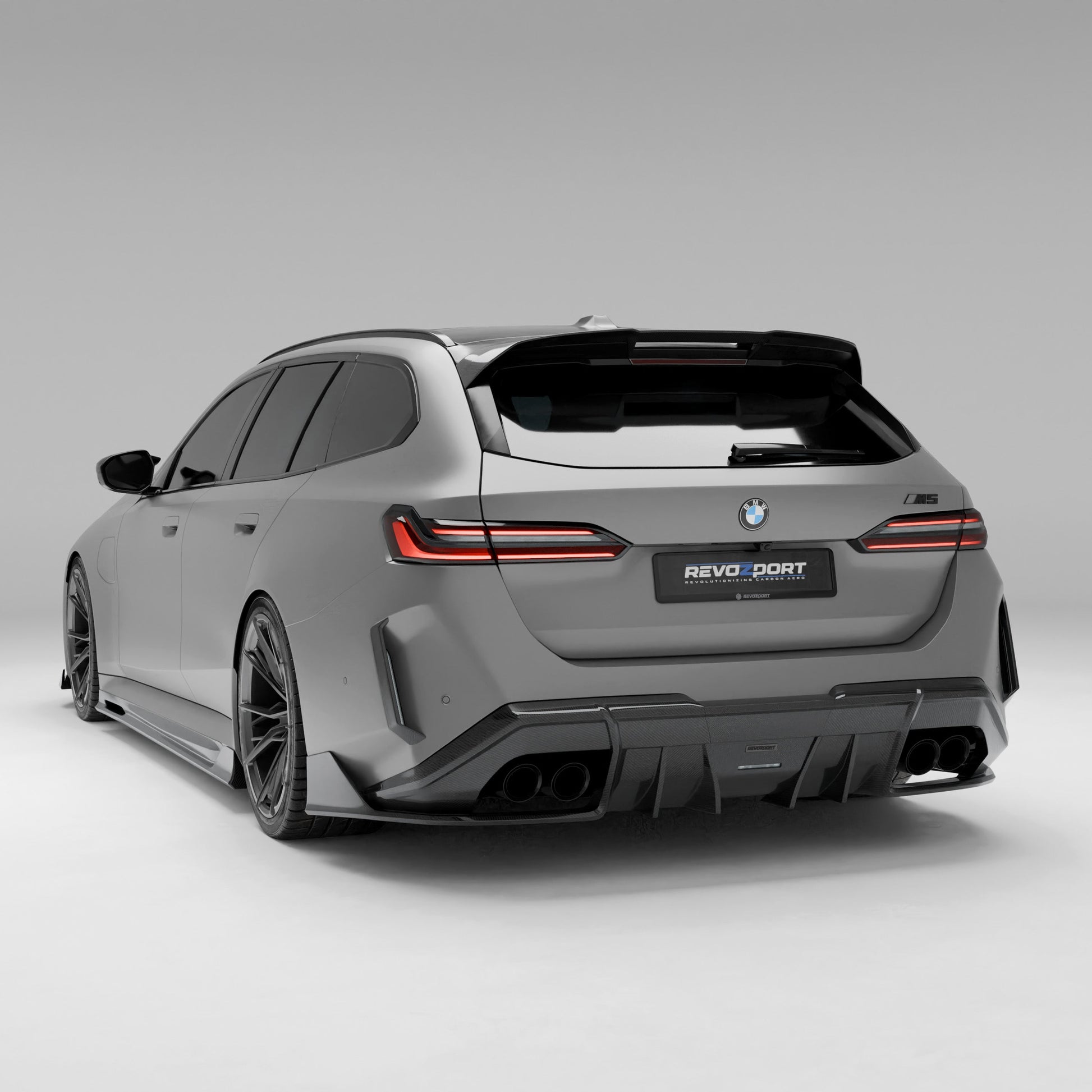 BMW M5 G99 carbon rear canards paired corner view