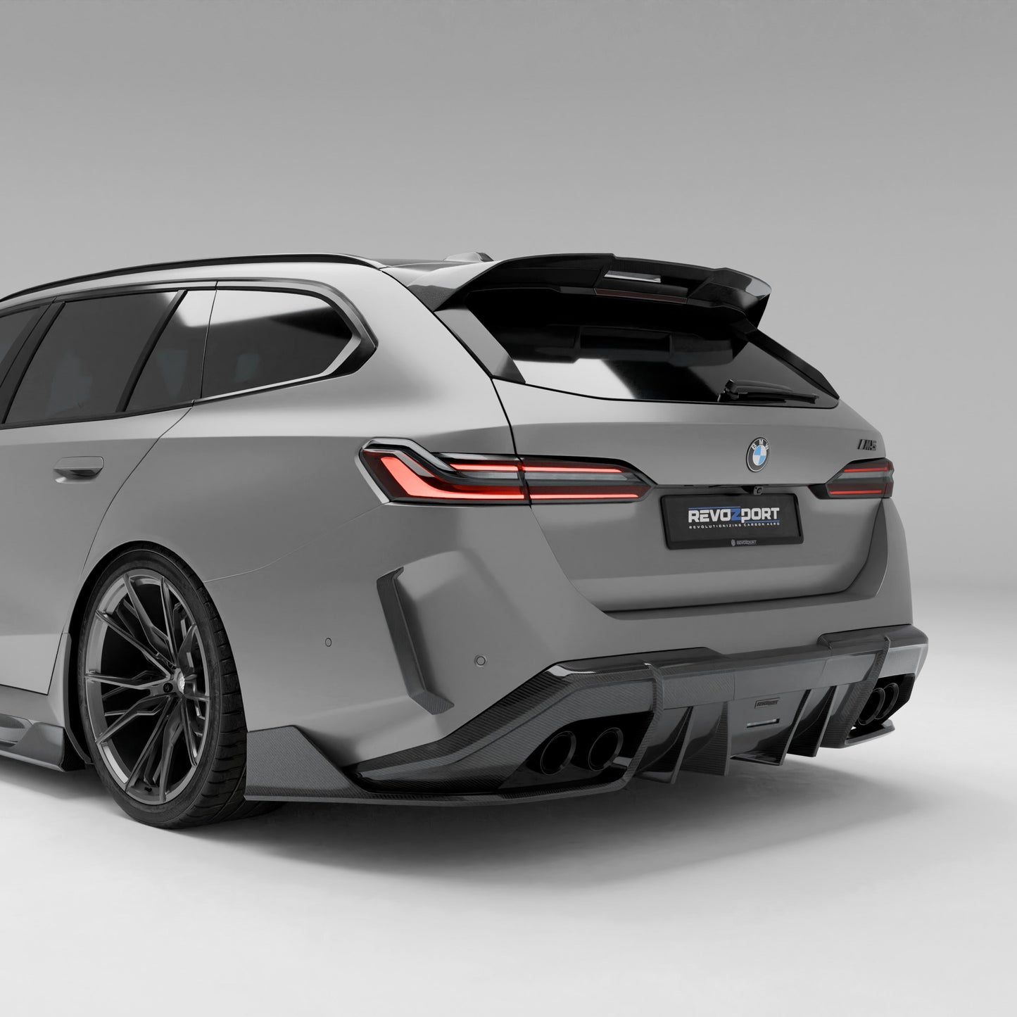 BMW M5 G99 Touring carbon fiber rear diffuser angled rear view