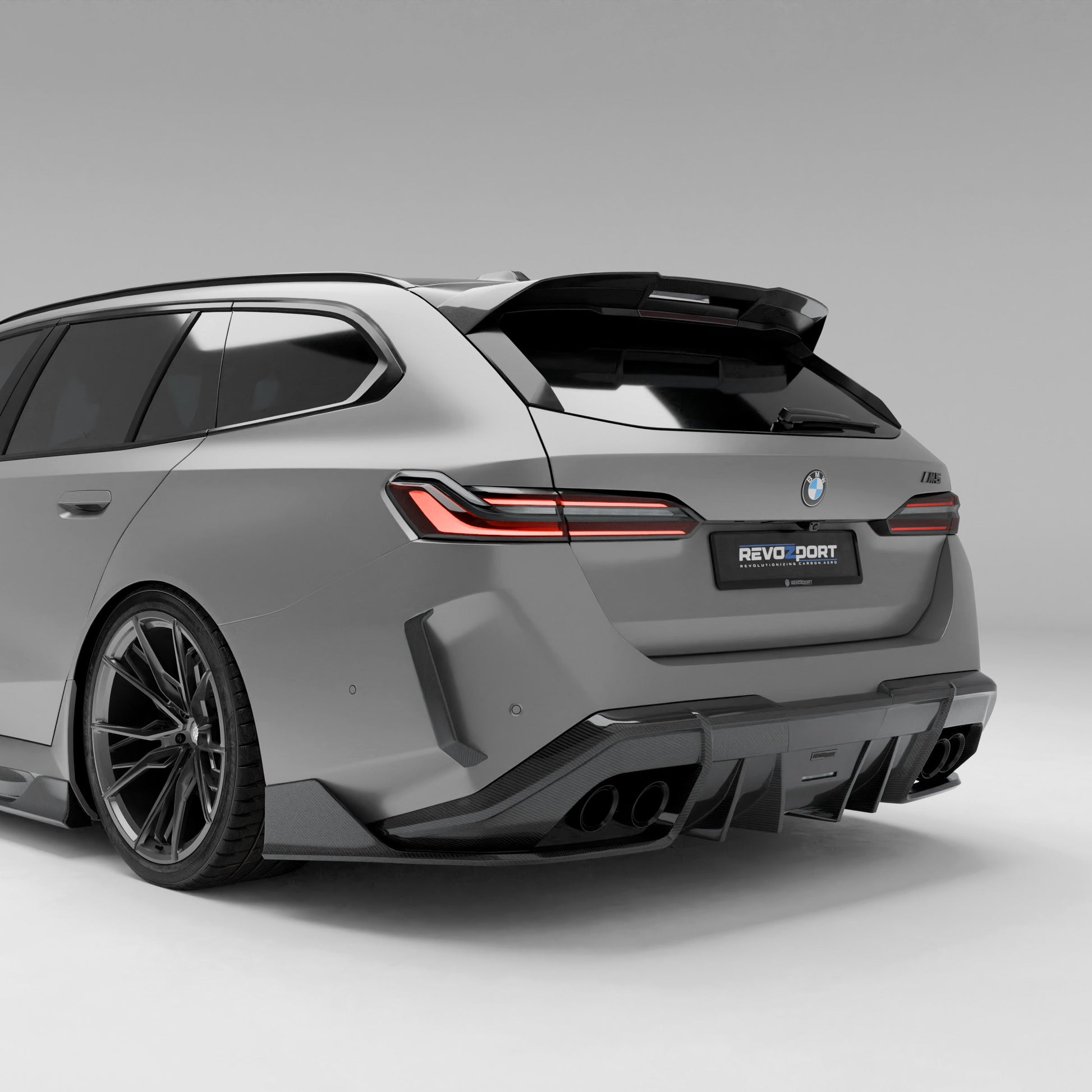 BMW M5 G99 Touring carbon fiber rear diffuser angled rear view