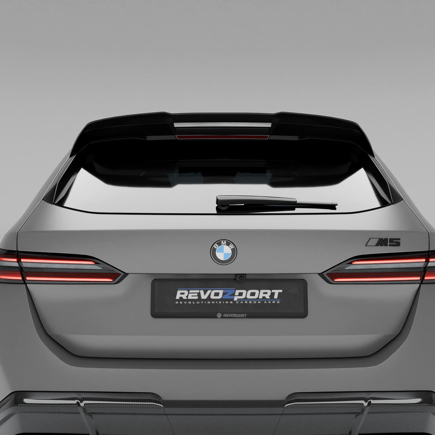 Close-up of carbon roof spoiler edge on BMW M5 G99