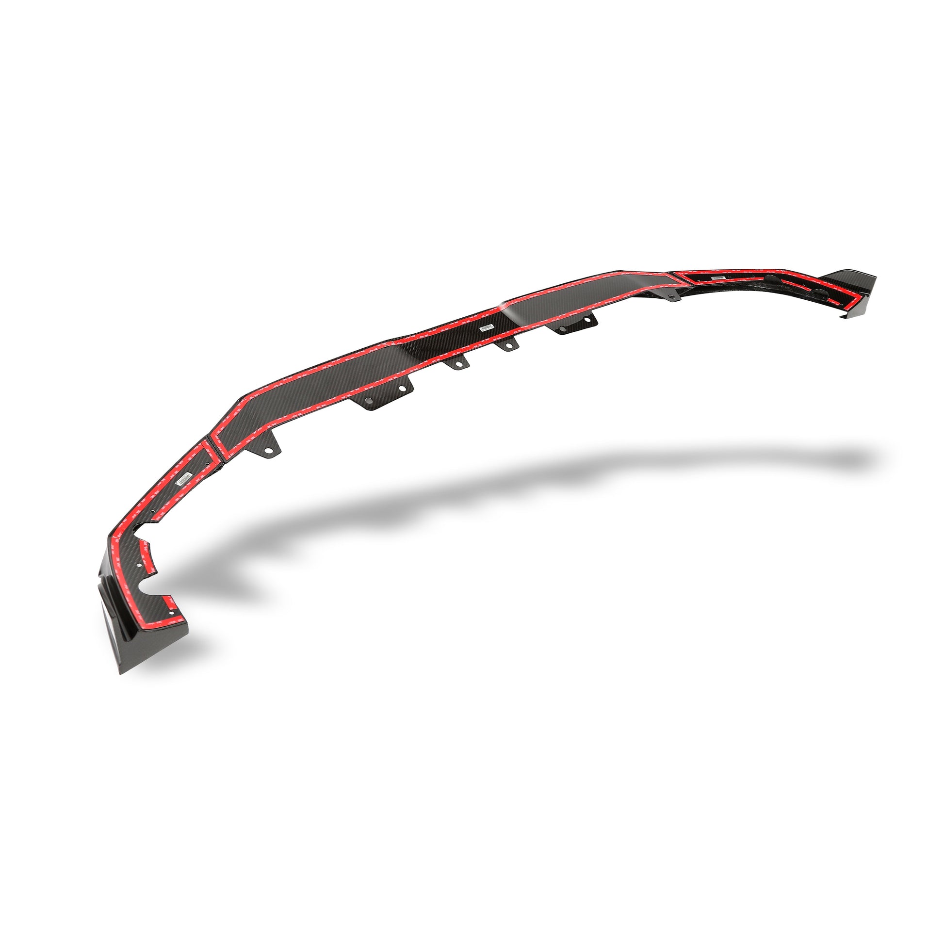BMW X5M F95 LCI carbon fiber front lip gloss surface close-up