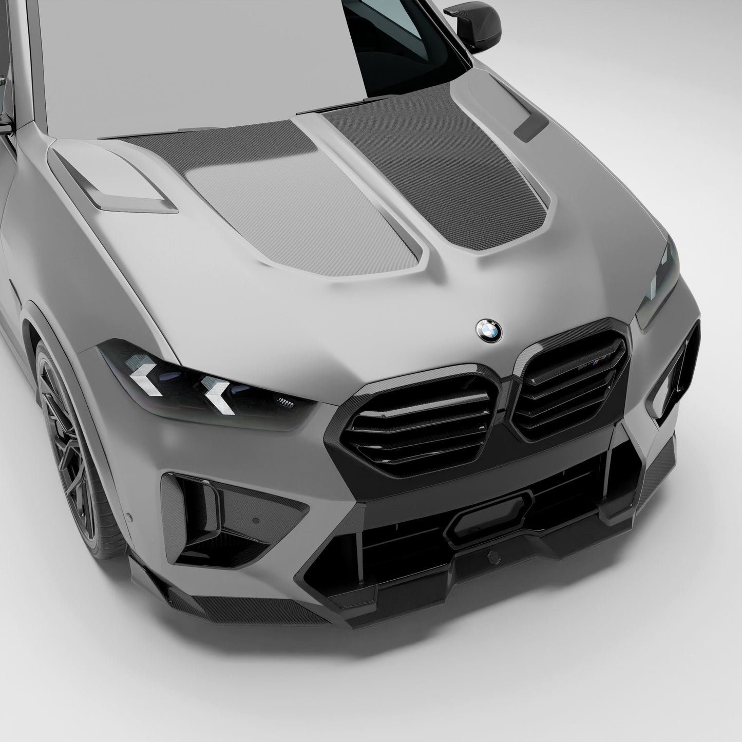 BMW X5M F95 LCI carbon fiber hood front three quarter view