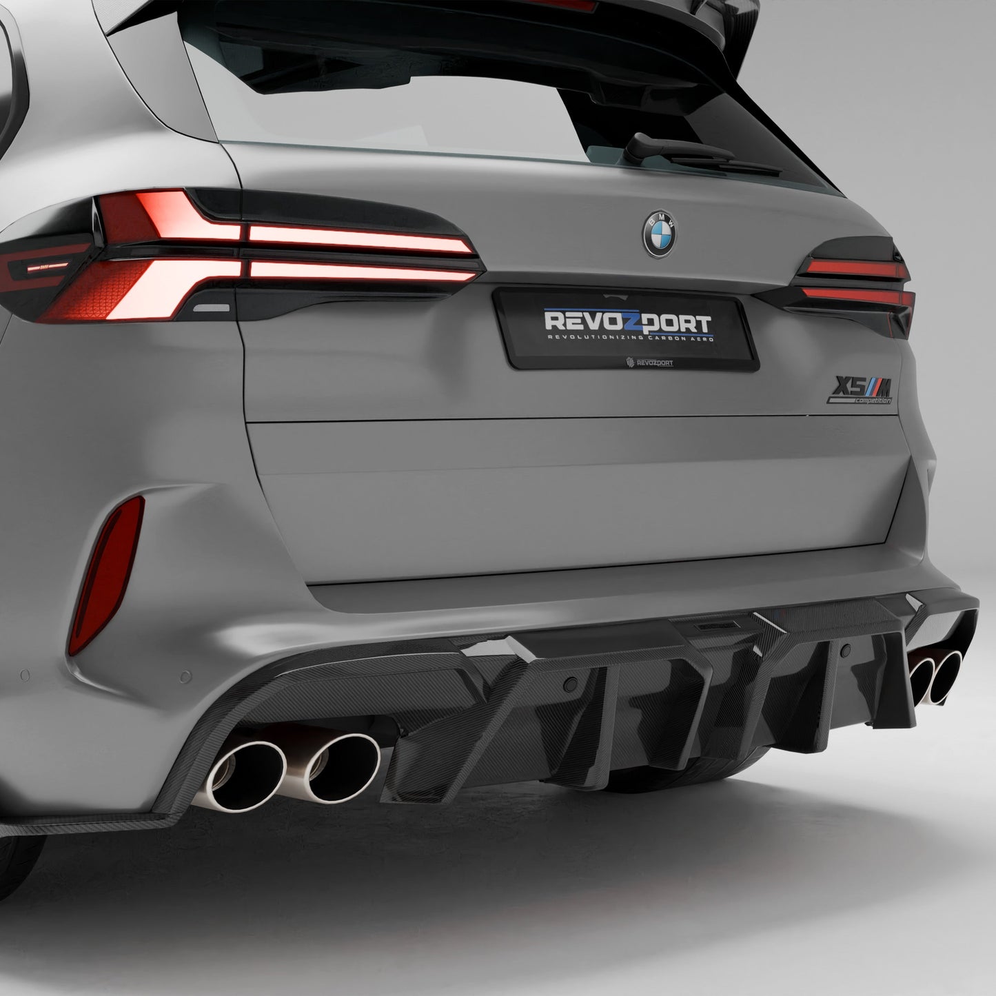 BMW X5M F95 LCI carbon fiber rear diffuser three-quarter rear angle