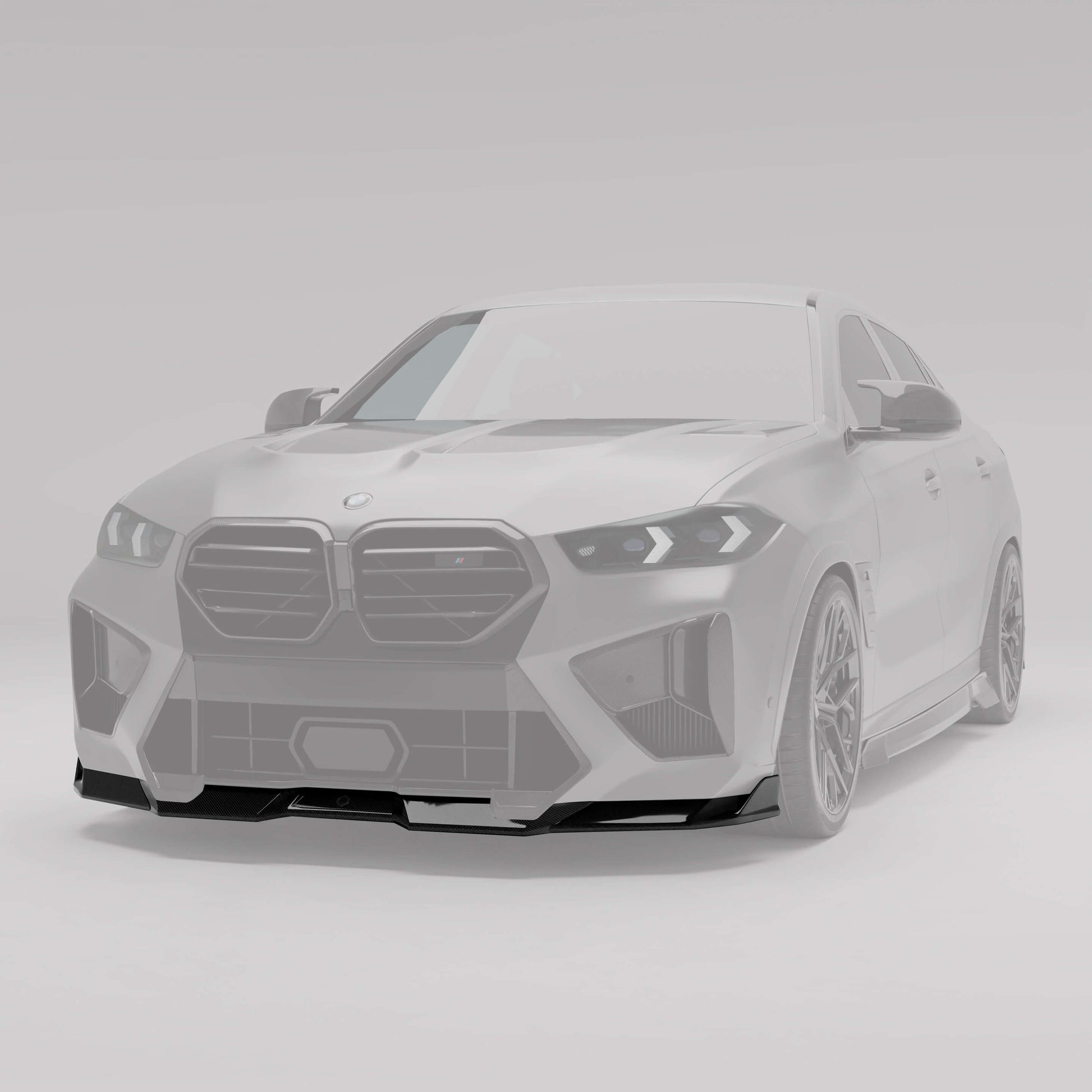 BMW X6M F96 LCI carbon front lip fitted to the lower bumper, angled view