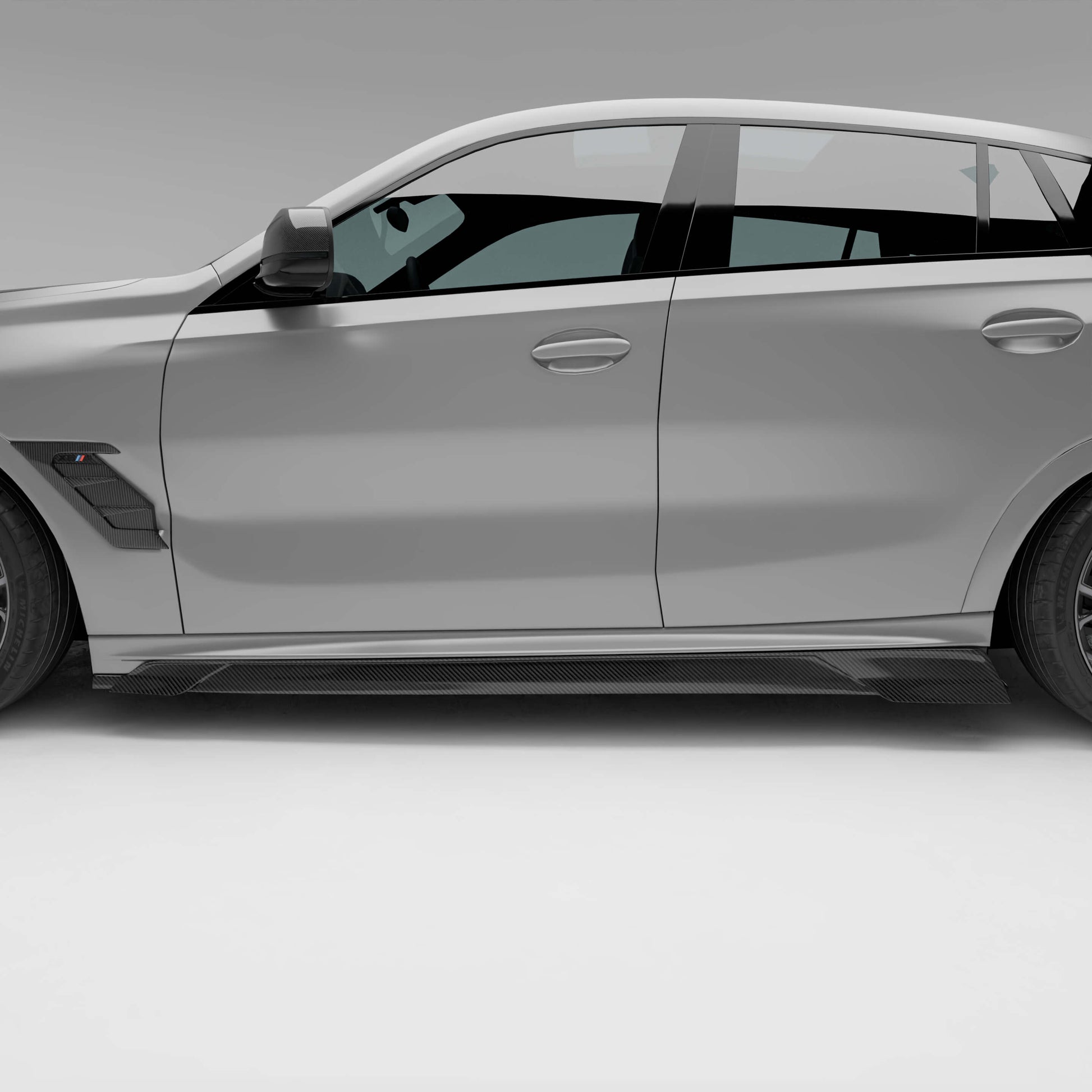 BMW X6M F96 LCI carbon side skirts, angled studio view
